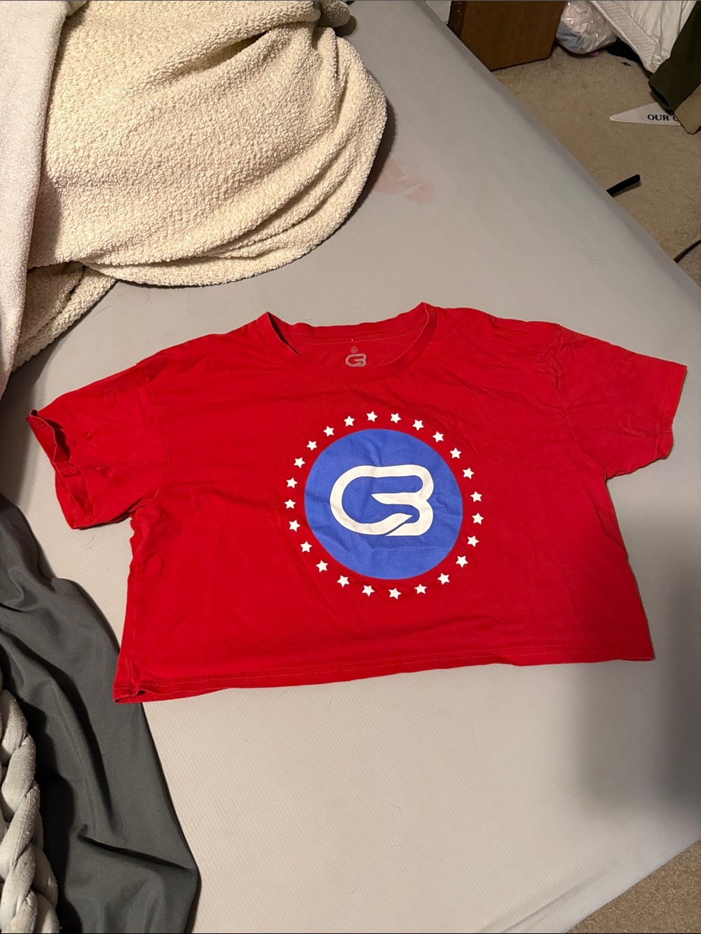 Cyclebar Red Crop Tee with Blue & White Star Emblem